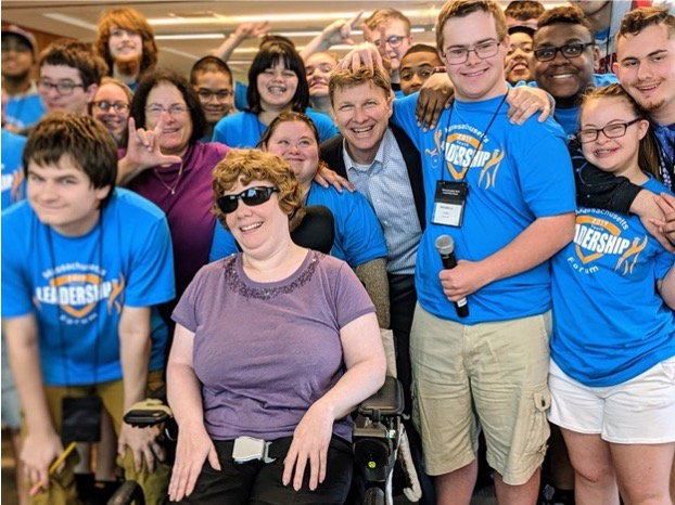 Derek Shields with a group of youth leaders at a community event